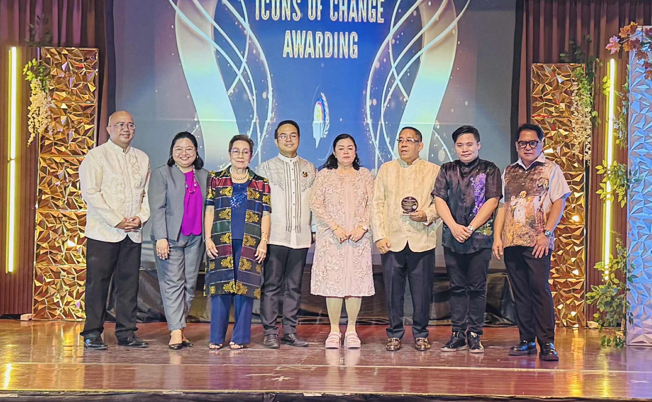 Sir Next and fellow participants in a group photograph on the Icons of Change stage
