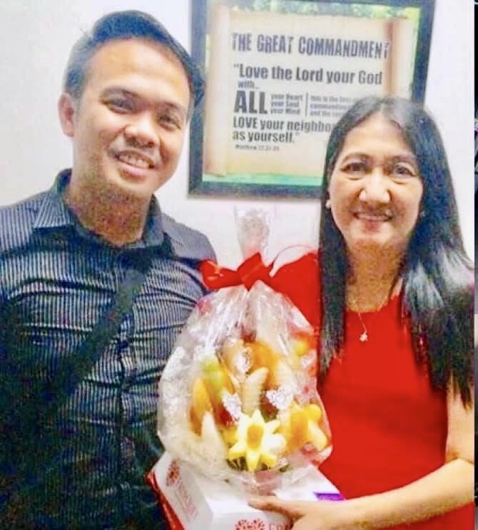 Brother Next with Pastora Kay Lopez and a birthday bouquet on 25 November 2016