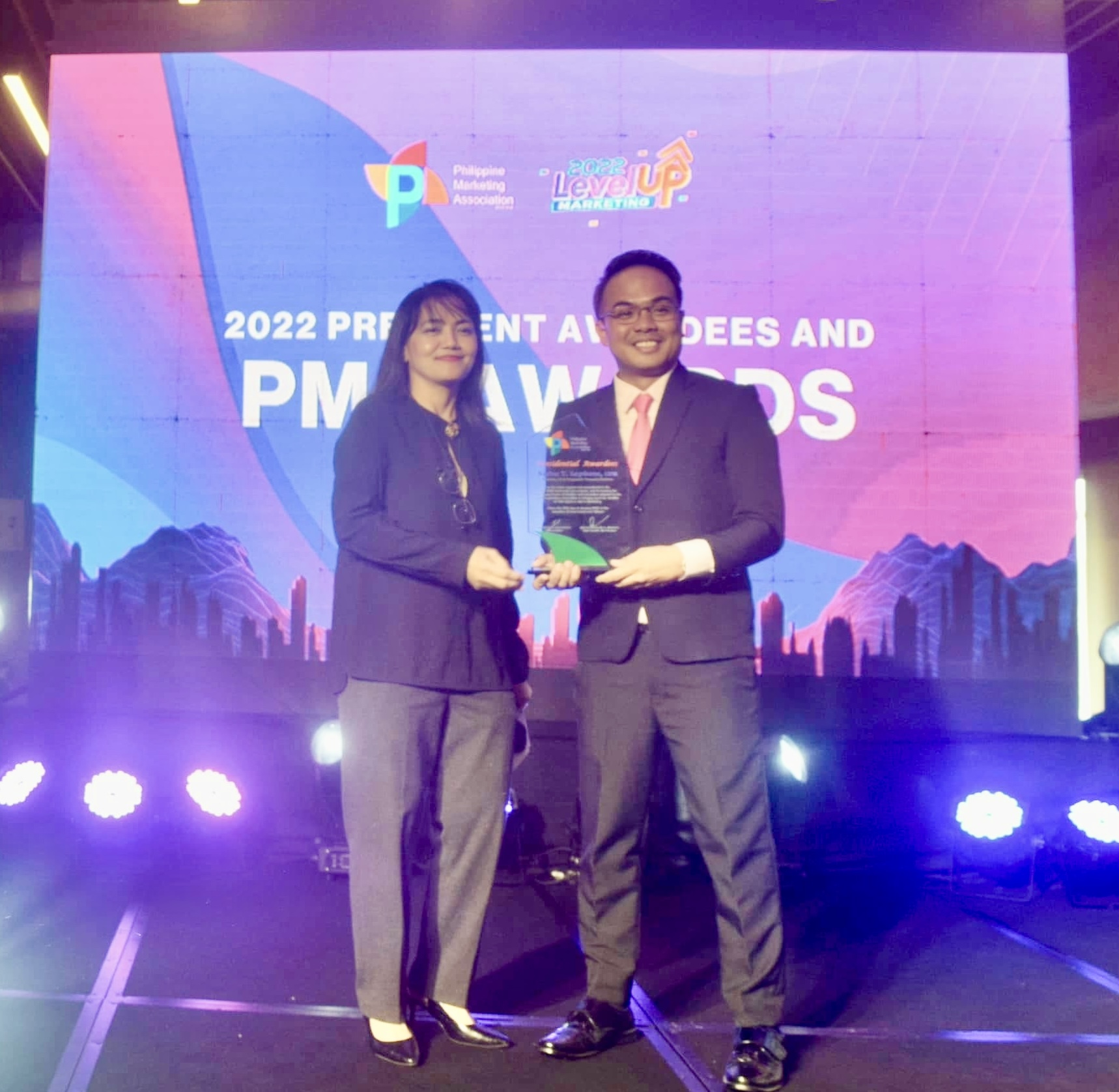 Sir Next receives the PMA Presidential Award from Maeyeth C. Cadungog during the January 26, 2023 celebration.