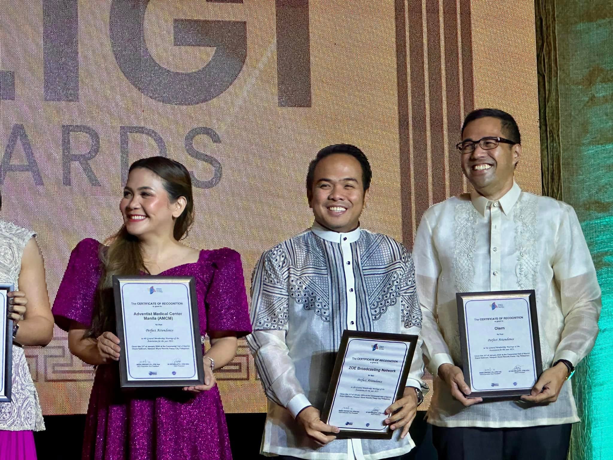 Sir Next joins fellow recognition recipients on stage at the PMA anniversary celebration.